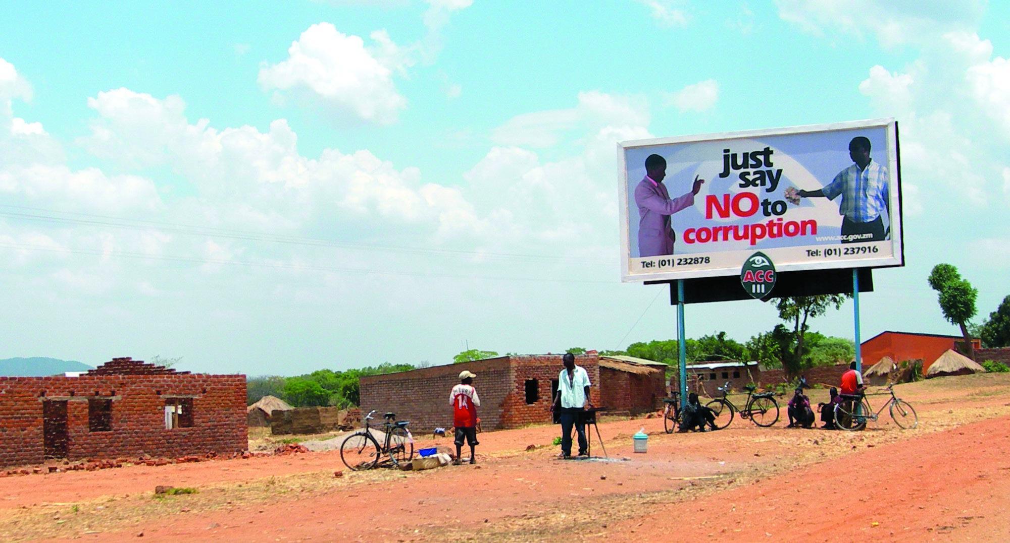 A billboard in Zambia exhorting the public to “Just say no to corruption.” Photo Source: Wikipedia.org