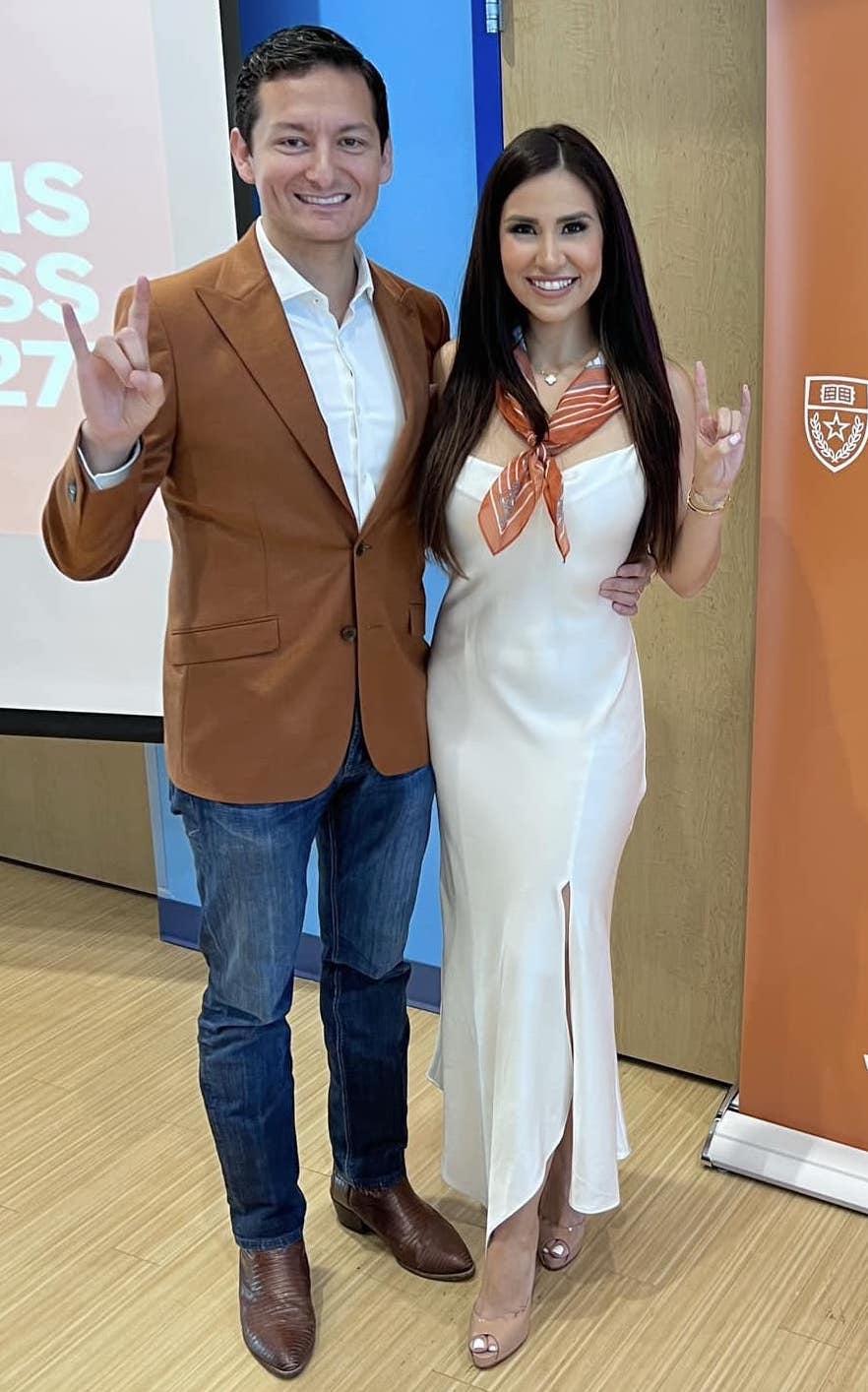 South Texas attorneys, and husband and wife Omar Ochoa and Leah Wise, flash the Hook ‘Em Horns hand signal of their alma mater, the University of Texas at Austin, during a reception held on April 15 honoring the most recent group of Rio Grande Valley students  to be admitted to the school. Photo Courtesy Omar Ochoa Facebook