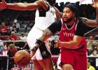 P.J. HERNANDEZ/ Advance News Journal Above: Daishen Nix looks to make a pass against the Austin Spurs on March 10 at the Bert Ogden Arena in Edinburg. Below: The new commemorative 20th season logo for the Vipers (Courtesy: RGV Vipers).