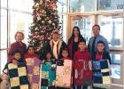 Quilters donate items to PSJA students