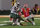 PHOTOS BY P.J. HERNANDEZ/ Advance News Journal Above left: UTRGV quarterback Aidan Jakobsohn looks to make a pass as Wes Thompson and Nick Hughes provide blocking for him against Southeastern Louisiana on Saturday in Edinburg. Above right: UTRGV’s Jacks