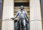 A statue of George Washington is seen in front of the Federal Hall National Memorial in New York. Zack Frank/ Adobe Stock