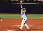 McAllen Memorial’s Maddie Gallardo winds up for a pitch against PSJA Southwest on Friday in Pharr. P.J. HERNANDEZ/ Advance News Journal