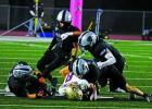 PSJA North defenders tackle Los Fresnos quarterback Evan McChesney on Friday at PSJA Stadium in Pharr. P.J. HERNANDEZ/ Advance News Journal
