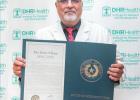DHR Health’s Rao honored for contributions