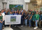 DHR Health, TOSA raise Donate Life flag to honor organ donors