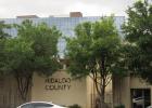 PHOTOS BY P.J. HERNANDEZ/ Advance News Journal Above: Hidalgo County signage is seen in front of the new courthouse on May 1, 2025 in Edinburg. Below: People walk around in downtown Edinburg on May 1, 2025.