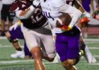 Weslaco's Christian Zamora stiff arms PSJA's Joe Herbert on Friday. | P.J. Hernandez/ANJ Article Image Alt Text