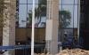 P.J. HERNANDEZ/ Advance News Journal Above: Crew members work to repair the damage of the Hidalgo County Courthouse in Edinburg on Monday. Left: The scene of the car crash that occurred Sunday at the Hidalgo County Courthouse in Edinburg (City of Edinburg